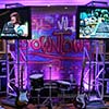 Interactive video game Rock band with stage available as party rental for Miami events