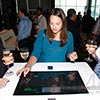 Interactive digital marketing engagement utilizes touch screen table at Miami event