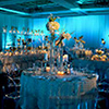 Soft lighting and unique floral centerpieces for Miami event